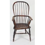 A high back Windsor armchair, 19th century, with a stick filled back,