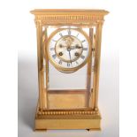 A good gilt brass four glass mantel clock, 19th century,