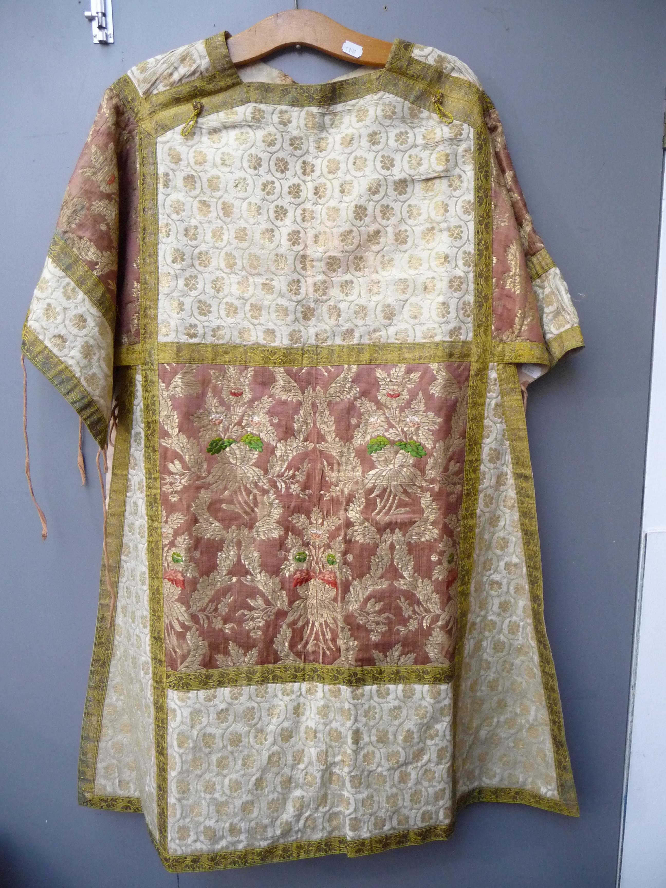 An eastern silk and metal thread over tunic, decorated with floral sprays and leaves, length 101cm. - Image 2 of 8