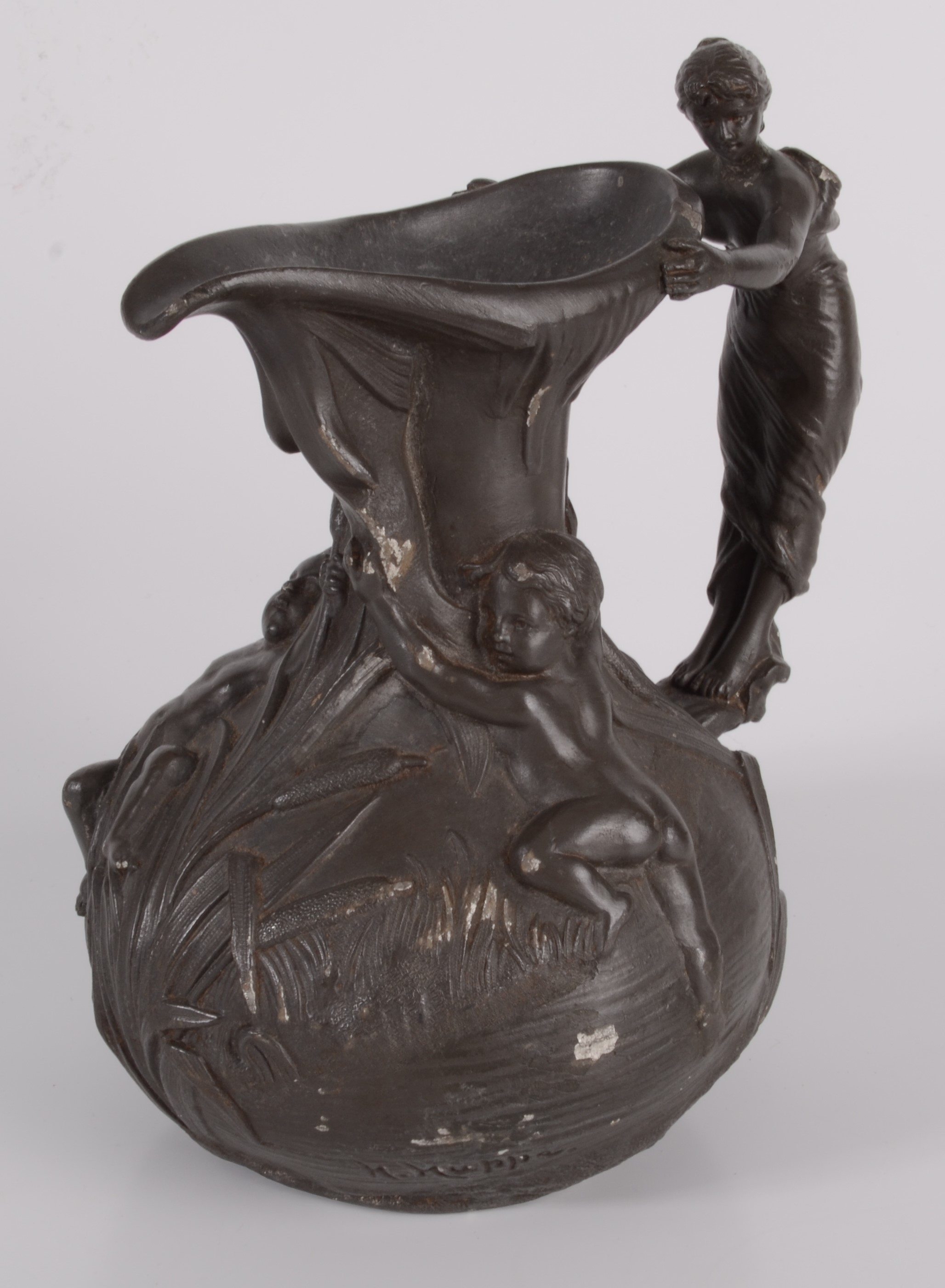 A Jean Garner French pewter jug, the handle modelled as a female figure,