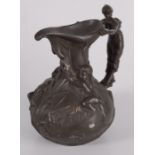 A Jean Garner French pewter jug, the handle modelled as a female figure,