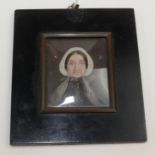 An early Victorian miniature portrait of a mature lady.