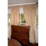 A pair of beige cotton curtains, with a wool lining, length 264cm, width at top 200cm,