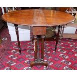 A Victorian burr walnut Sutherland table, the oval top on turned supports, height 72, depth 76cm,
