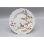 A Chinese export porcelain plate, 18th century, gilt decorated with a deer amongst foliage,
