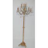 A gilt painted metal and Venetian glass six branch standard lamp, height 176cm.