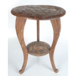 A Japanese carved wood occasional table, early 20th century, signed Y.