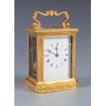A fine French engraved gilt brass carriage clock by Paul Garnier no 1942,
