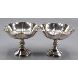 A pair of late Victorian or Edwardian silver bon bon dishes,