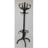 A bentwood hat and coat stand, stamped Thonet, height 203cm.