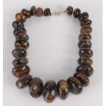 A graduated 'amber' bead necklace.