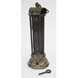 A brass and gauze Davy type miners lamp, the brass domed top with impressed initials E.C.C.