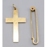 An 18ct gold plain cross and a 15ct gold pin. 6.7g.