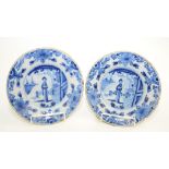 A pair of Delft blue and white plates, late 18th/early 19th century,