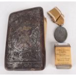 A German West Wall medal, together with a Berlin souvenir armorial wallet, a Russian document,