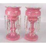 A pair of Victorian pink glass lustres,