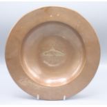 A Newlyn copper shallow bowl, the centre decorated St Michaels Mount, within a hammered border,