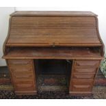 An oak roll top desk, early 20th century,