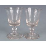 A pair of wine glasses, 19th century, height 12cm.