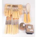 A set of six silver fish knives and forks, together with a pair of silver plated fish servers,