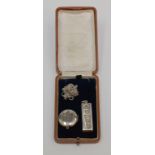 A silver 1977 1oz ingot pendant, a silver locket and a silver chain, together with a necklace box.