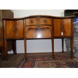 A serpentine mahogany sideboard, 19th century,