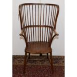 A large Windsor type armchair, late 19th century, with a stick filled back,