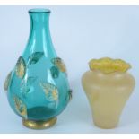A Loetz style yellow ground baluster vase with a shaped flared rim,