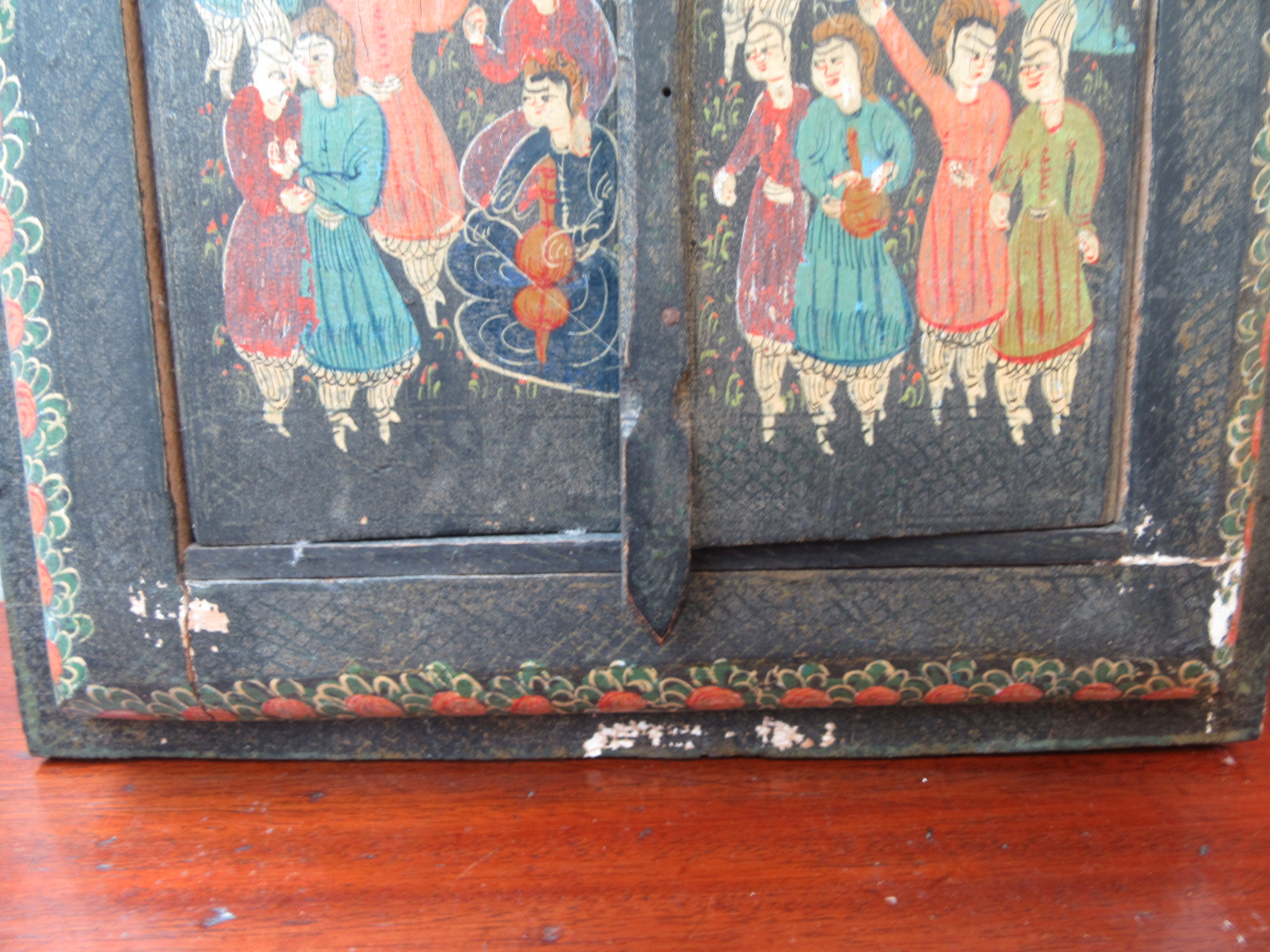 A Persian wall mirror, in a painted wood cabinet with a pair of doors decorated with figures, - Image 8 of 9