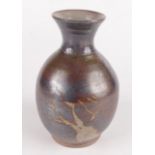 A studio pottery baluster vase, height 15cm.