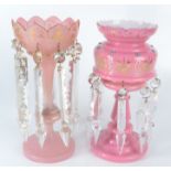 Two Victorian pink glass lustres, the first with over enamelled and gilt decoration, height 31.