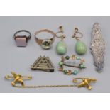A gold ring, a gold bird mounted double brooch, a pair of gold mounted earrings etc.