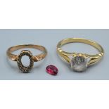 An 18ct gold ring set a white stone, a gold ring with red stone and diamond cluster, 7.2g.