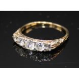 A Victorian style five stone diamond ring in 18ct gold.