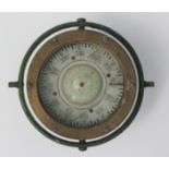 A brass and green painted ship's compass, total diameter 17cm.