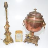 A copper tea urn, 19th century, with brass tap, height 39cm, width 24cm, a gilt metal lamp base,