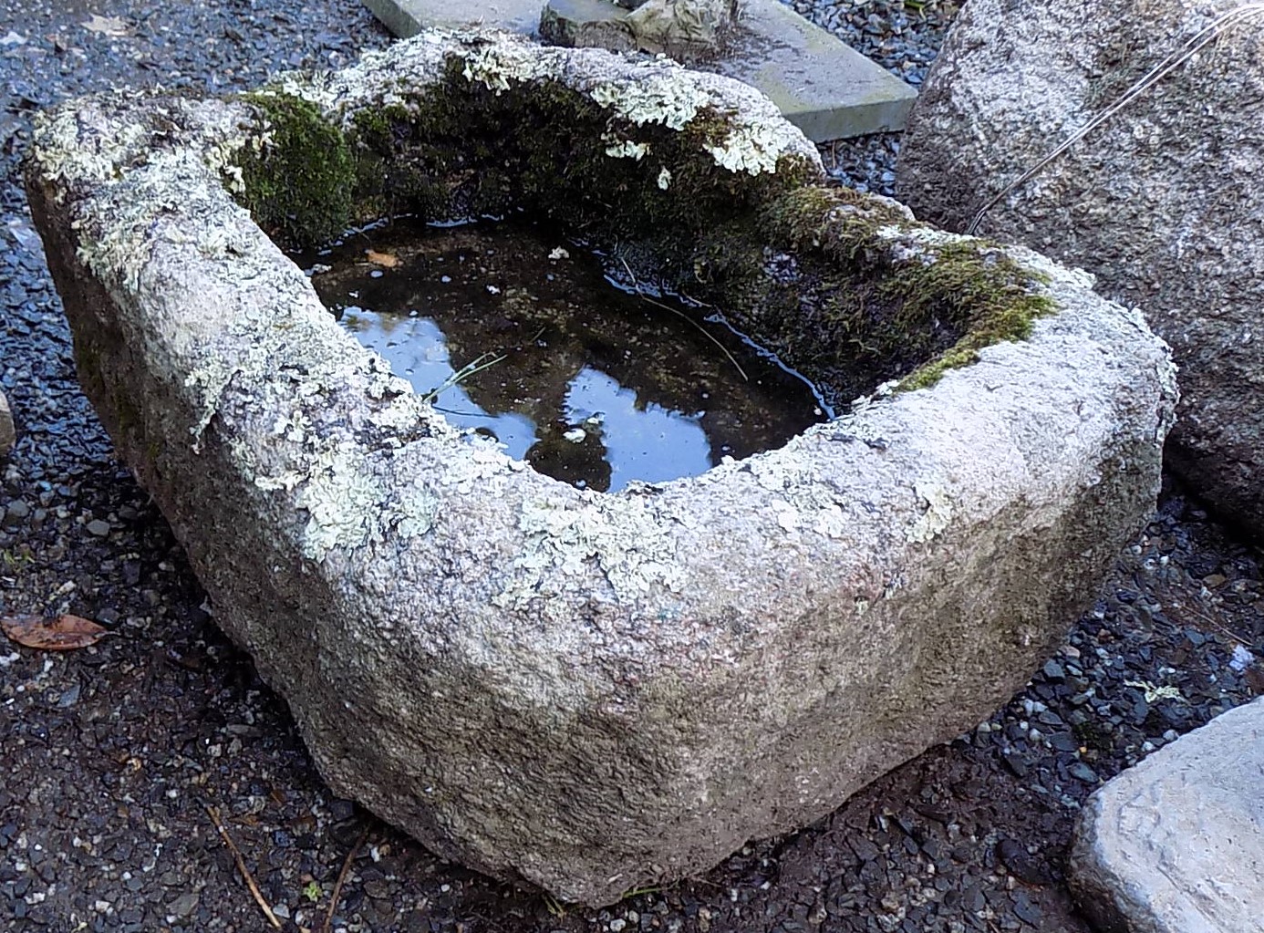 A rectangular granite trough, height 26cm, width 53cm, depth 43cm.