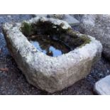 A rectangular granite trough, height 26cm, width 53cm, depth 43cm.