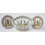 Eight French Henriot Quimper pottery plates, decorated with figures in traditional costume,