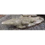 A composition garden statuary figure of a crocodile, length 86cm.