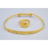 A Chinese very high purity babies gold ring and matching bangle 5.