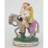 A Staffordshire porcelain figure entitled 'Sancho Panza', 19th century, height 10.5cm, width 8cm.