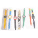 A Swatch Fornasetti watch (new, boxed), together with other Swatch and Swatch type watches.