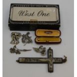 Two silver and marcasite brooches, a crucifix etc.