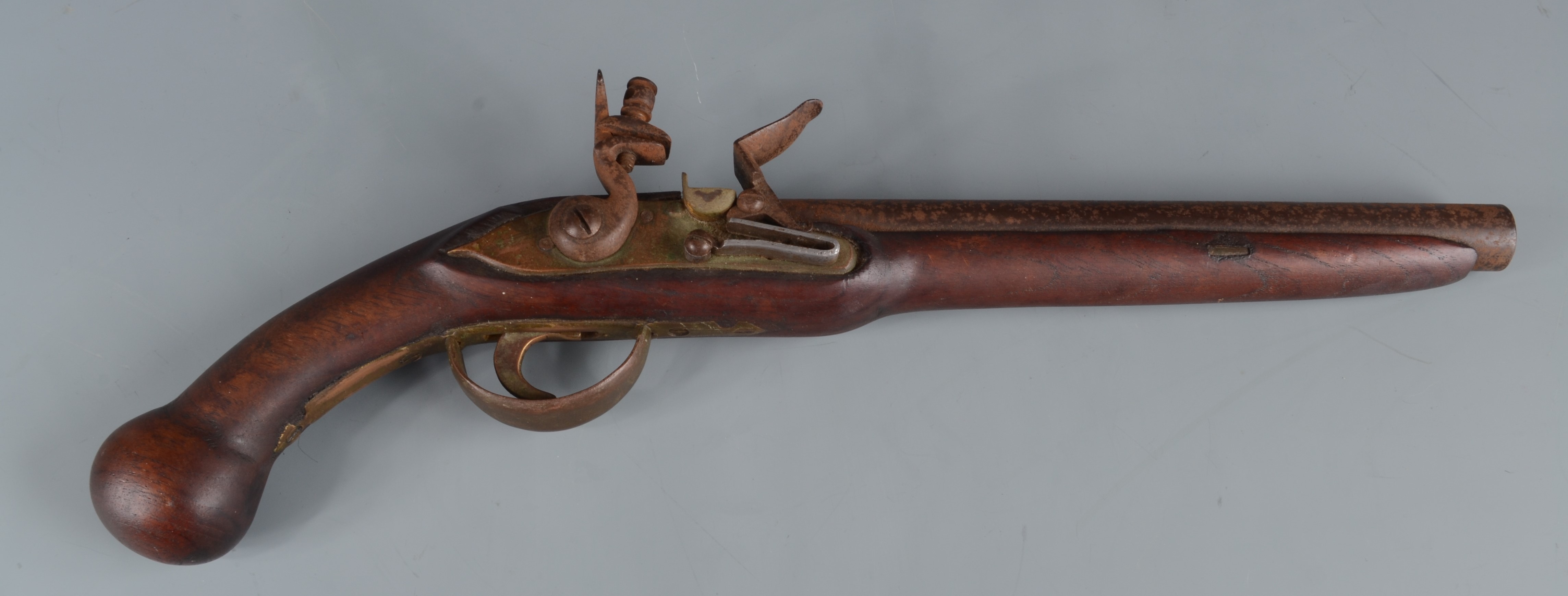 A flintlock pistol, with 25.5cm barrel and mahogany stock, overall length 43cm.