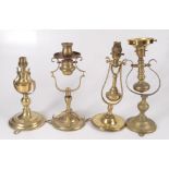 Four brass ship's gimble lamps, height of tallest 31cm, height of smallest 25cm,
