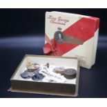 Jewellery etc. in a George V chocolate box.