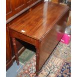 A mahogany drop leaf dining table, 19th century,