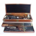 A mahogany cased set of surgical instruments, late 19th/early 20th century,