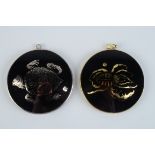 Two silver and verre églomisé pendants by Frances Federer one showing a turtle and the other an